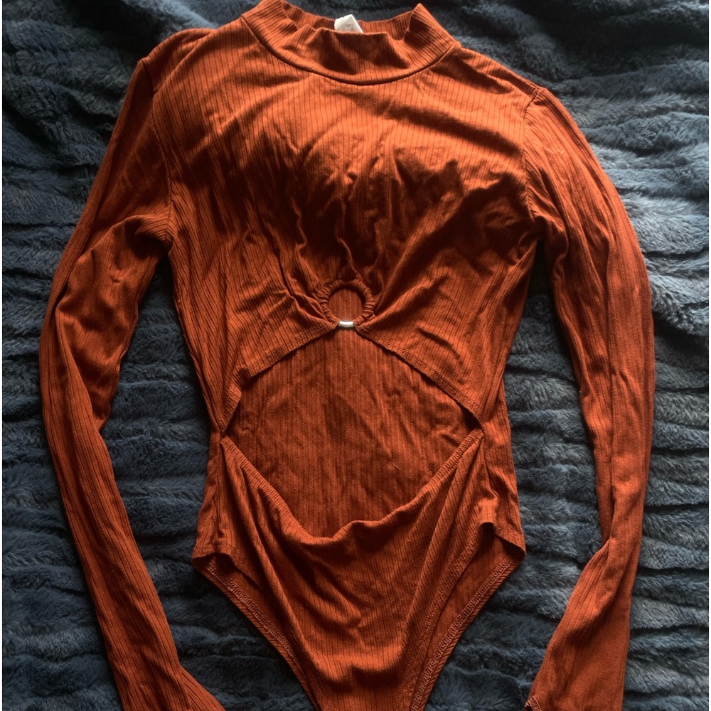 Orange ribbed open belly style bodysuit